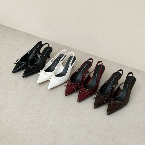 Set of women's pointed-toe shoes with bow details in various colors on a neutral background